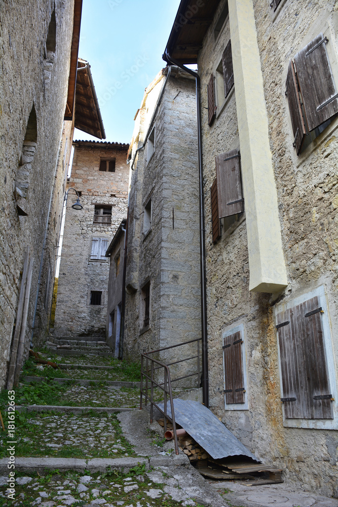 A small street in the hill village of Erto in Friuli Venezia Giulia, north east Italy. A small street in the hill village of Erto in Friuli Venezia Giulia, north east Italy.