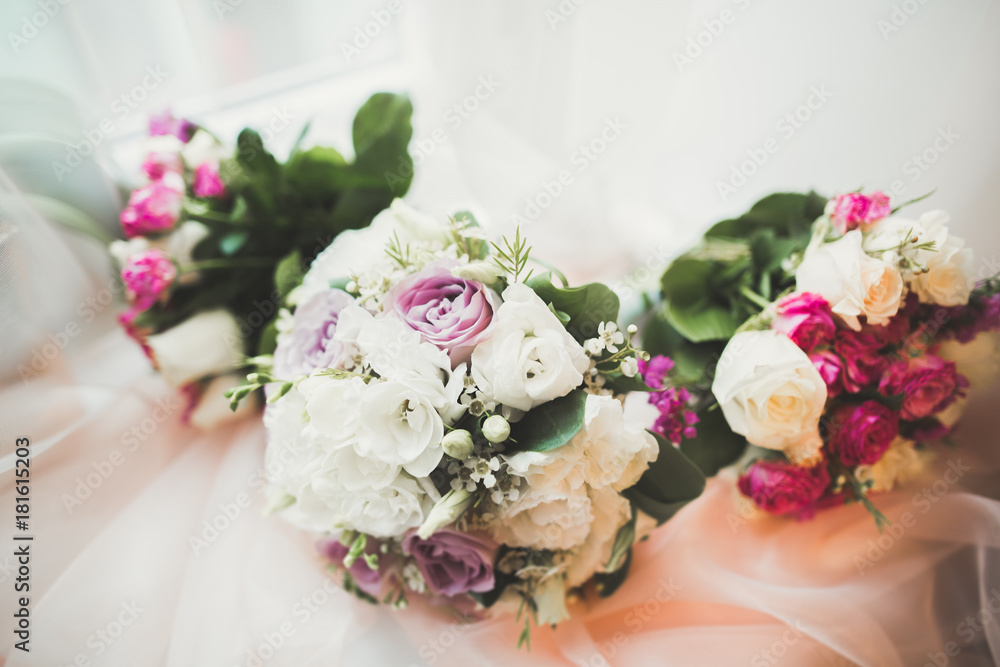 Beautiful wedding bouquet with different flowers, roses Beautiful wedding bouquet with different flowers, roses