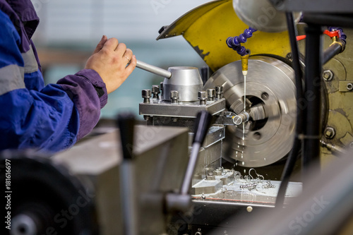metal lathe works and turner's hands