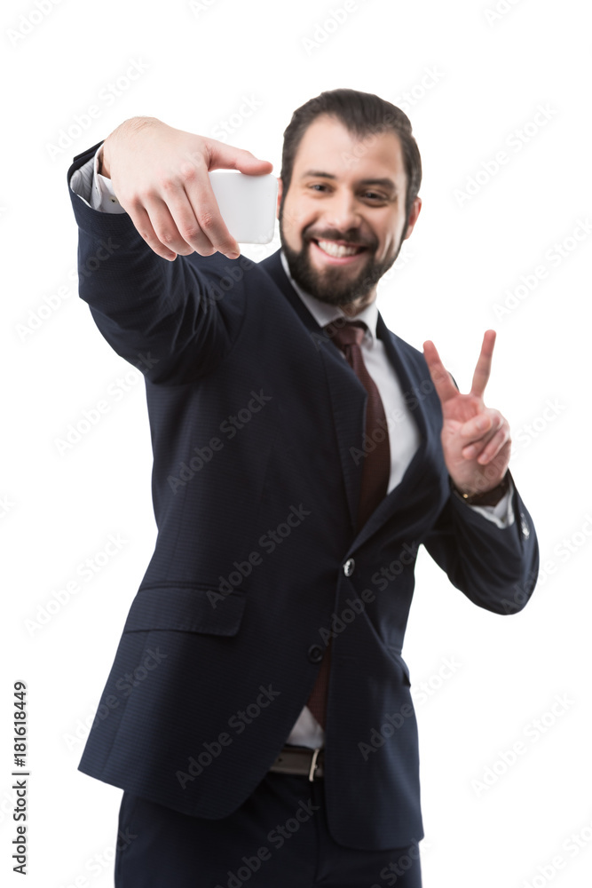 businessman taking selfie on smartphone businessman taking selfie on smartphone