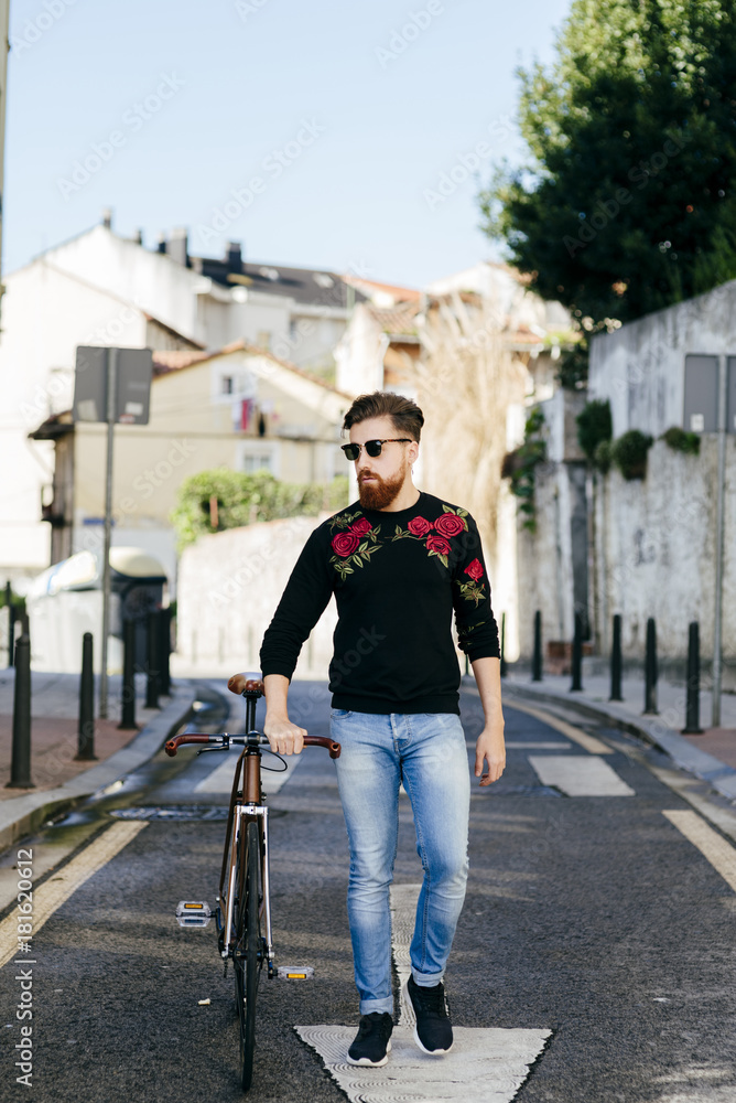 Stylish man with bicycle on street Stylish man with bicycle on street