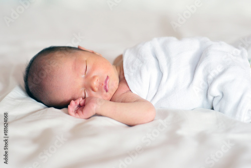 Asian newborn baby boy sleeping