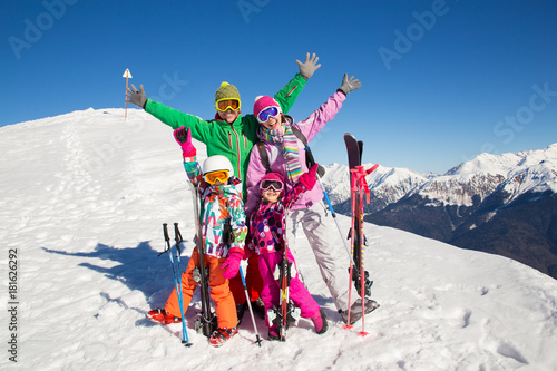 family in alpin ski resort
