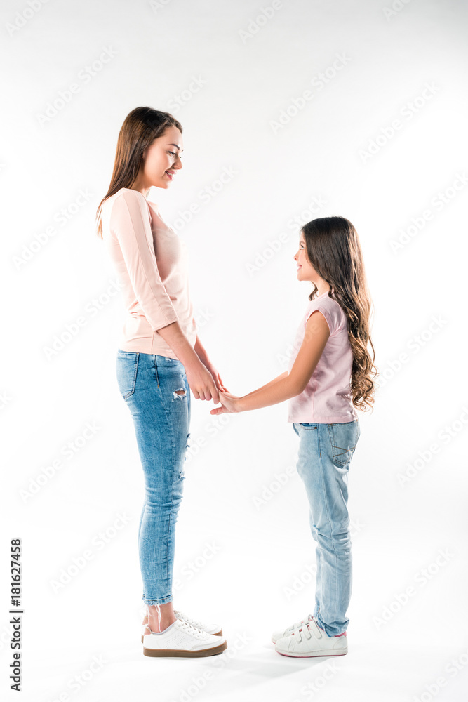 mother and daughter holding hands mother and daughter holding hands