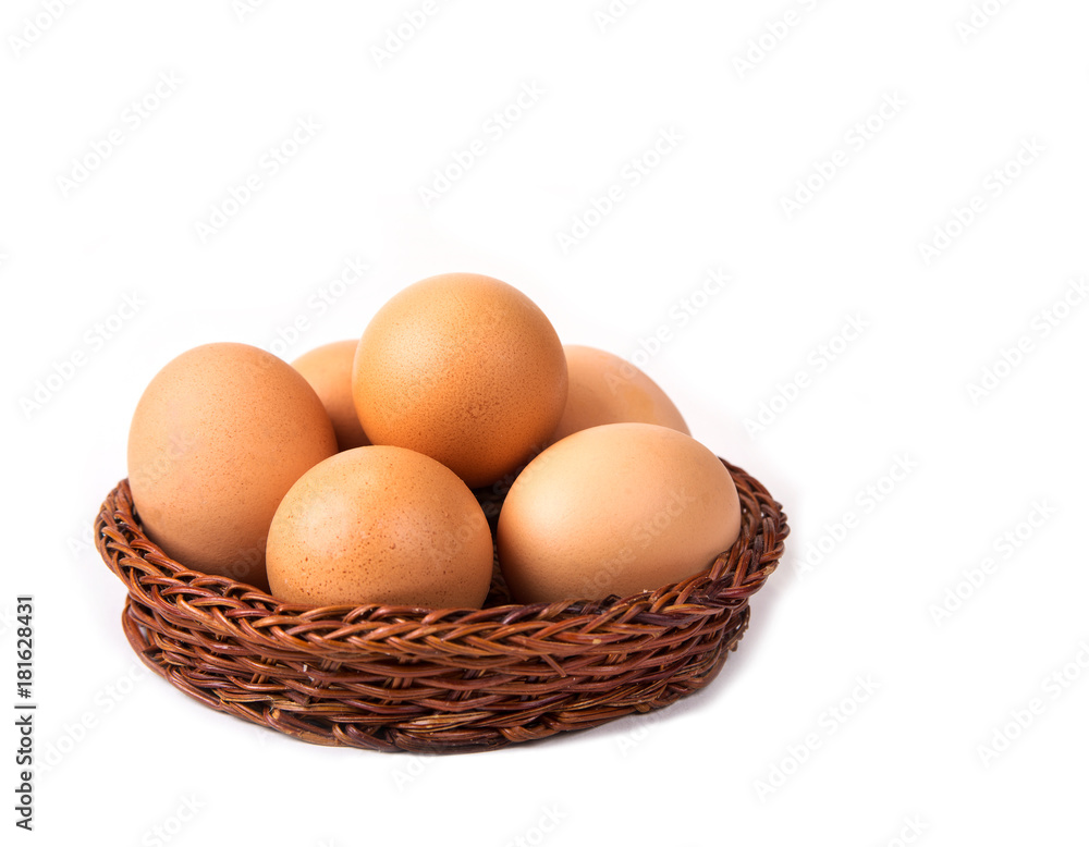 Eggs with euro coins money in basket on white. Eggs with euro coins money in basket on white.