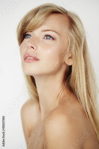 Gorgeous blue eyed blond beauty, looking up