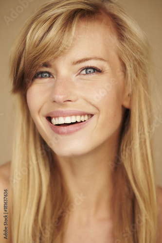 Laughing blue eyed babe in close up, portrait