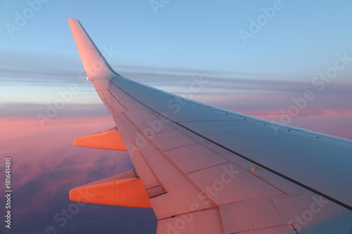 View from window on wing of plane in flight