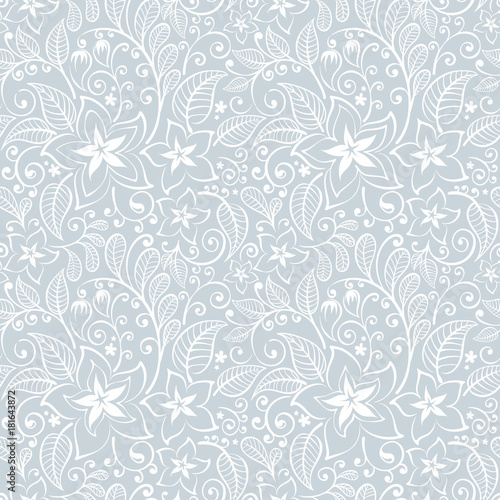 Floral seamless pattern. Light blue and white background in the style of Boho