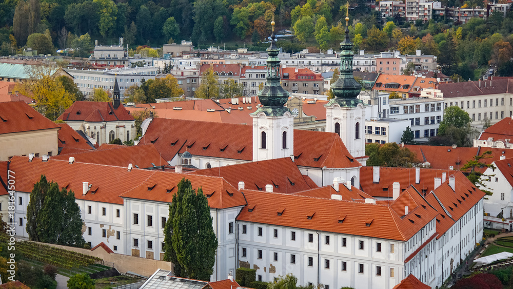 Obraz premium Aerial view of the Old Town architecture with red roofs in Prague , Czech Republic.