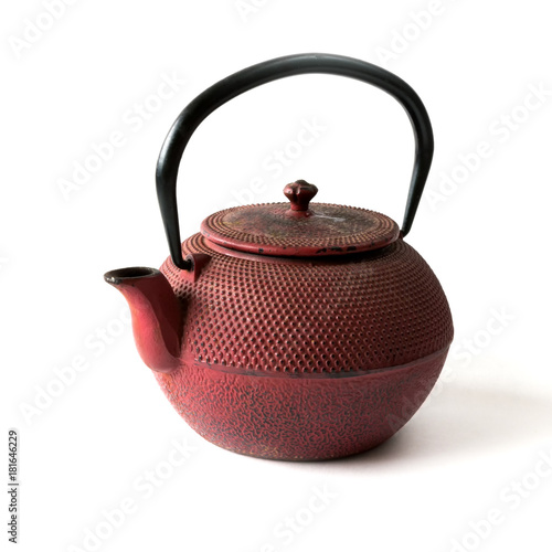 Old antique cast iron teapot on white background isolated close-up