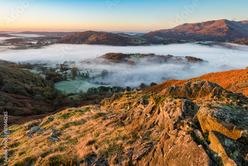 View of Lake District valley covered in a layer of mist on an Autumnal morning.