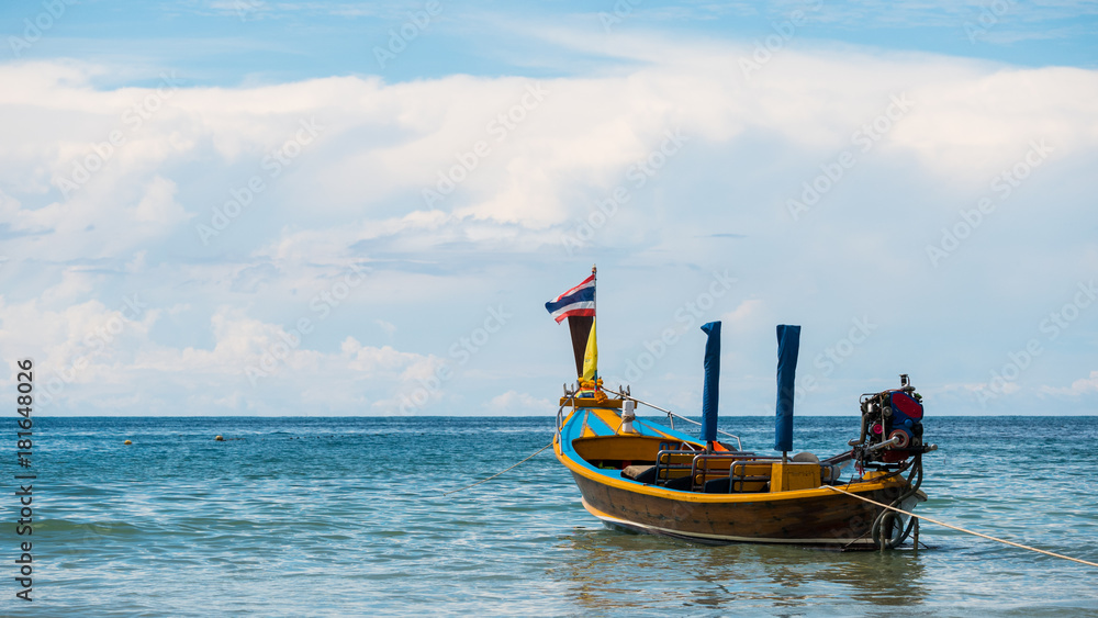 Long-tail boats converted boat excursions. floating on the andaman sea in travel and transportation concept.. Long-tail boats converted boat excursions. floating on the andaman sea in travel and transportation concept..