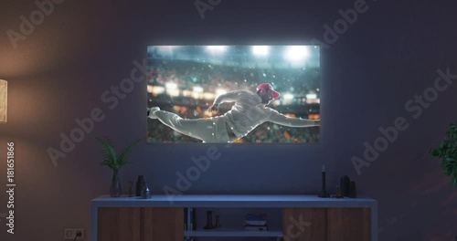 Cricket game on living room tv set photo