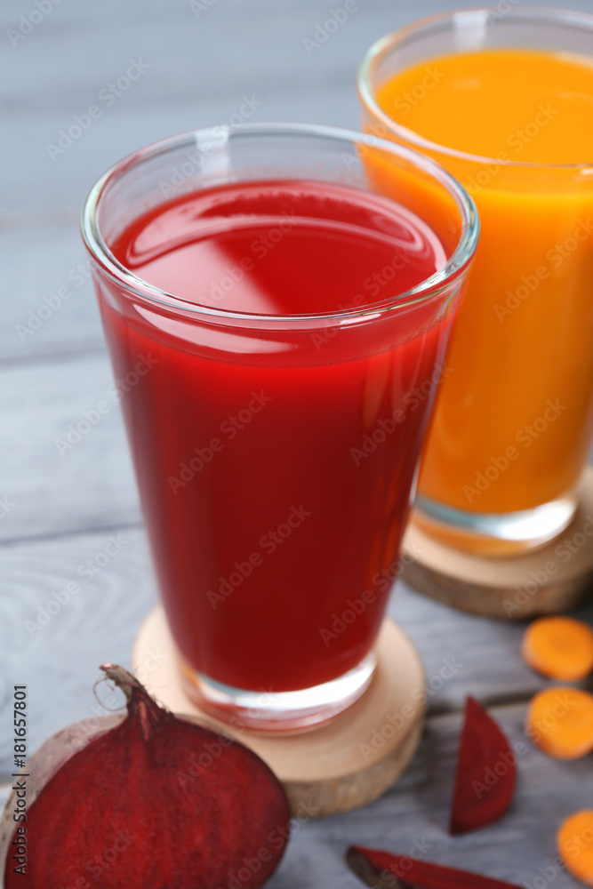 Glasses with various fresh vegetable juices, closeup Glasses with various fresh vegetable juices, closeup