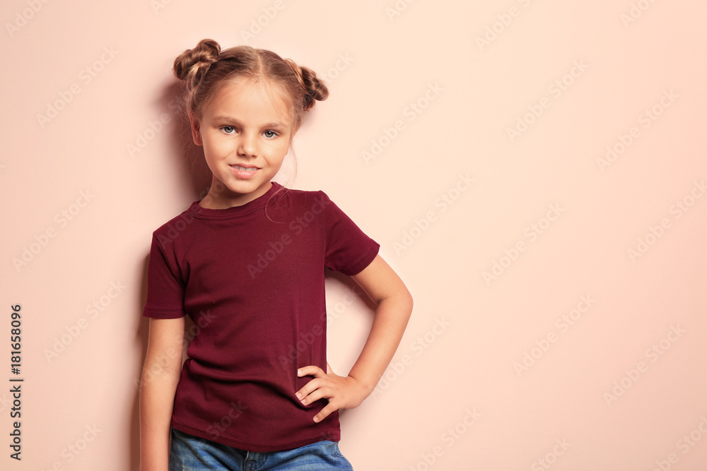 Little fashionable girl on color background Little fashionable girl on color background