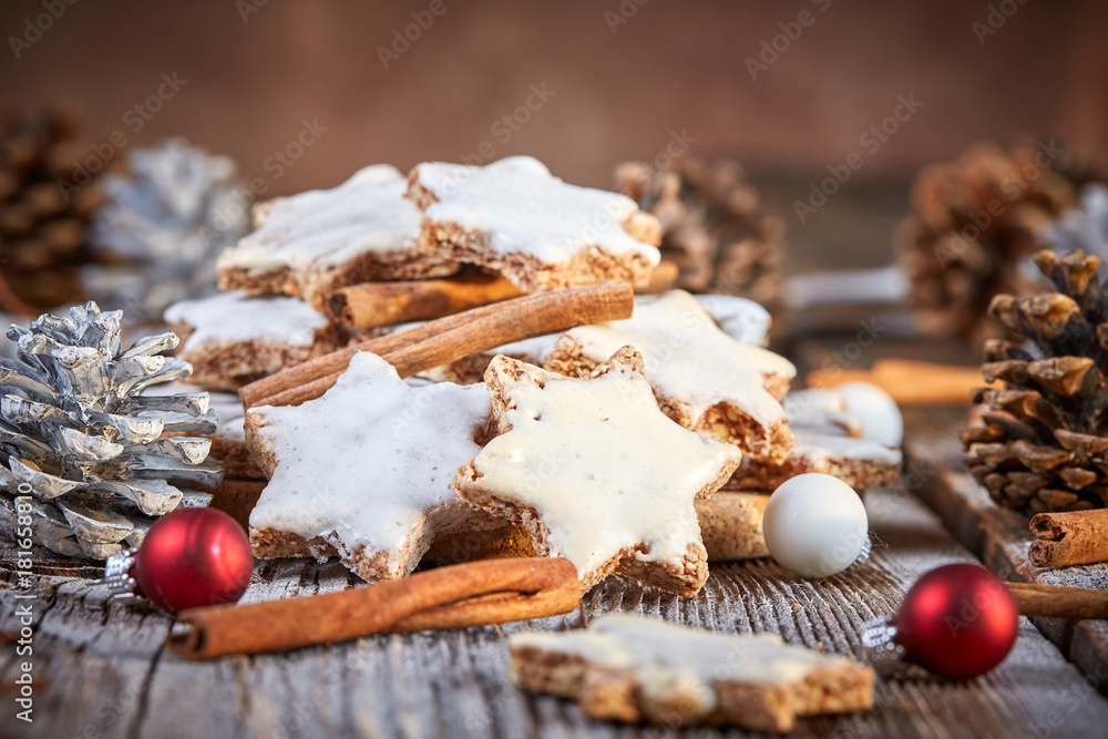 Christmas cinnamon cookies Zimtsterne decorative on wooden table Christmas cinnamon cookies Zimtsterne decorative on wooden table