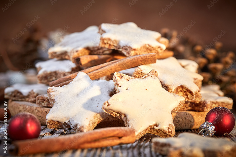 Christmas background with table of cinnamon cookies Christmas background with table of cinnamon cookies