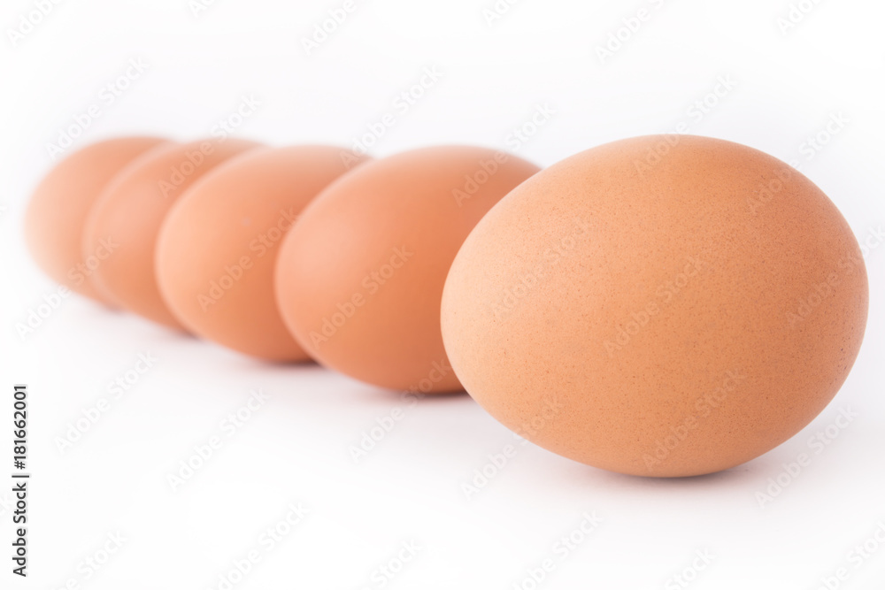 Five eggs are isolated on a white background Five eggs are isolated on a white background