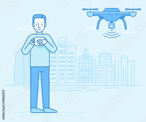 Man holding flight controller and drone flying over city