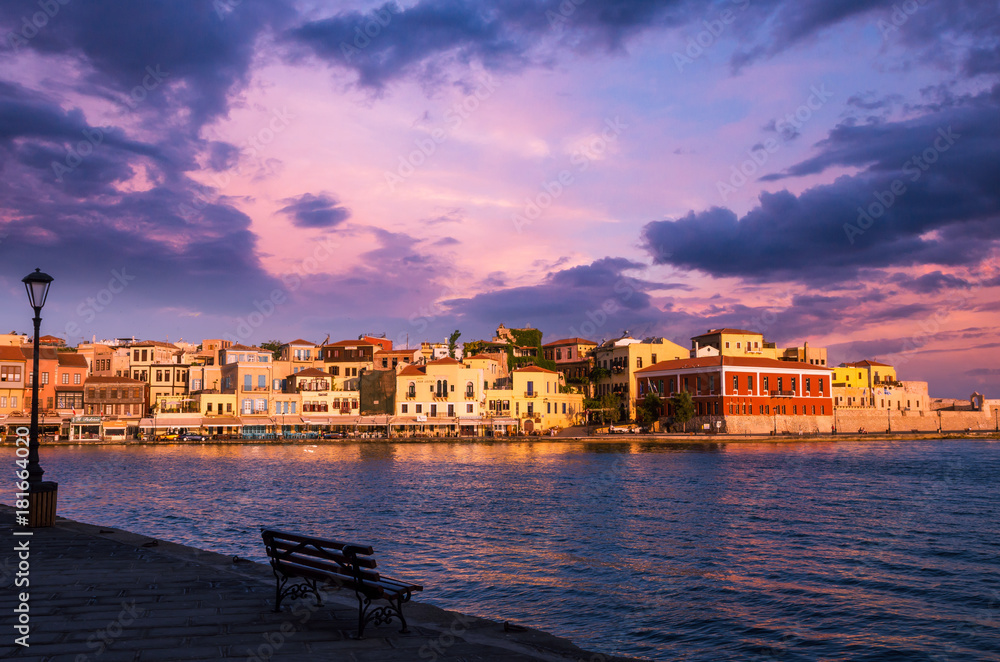 Stunning sunset view of the old venetian port of Chania on Crete island, Greece.