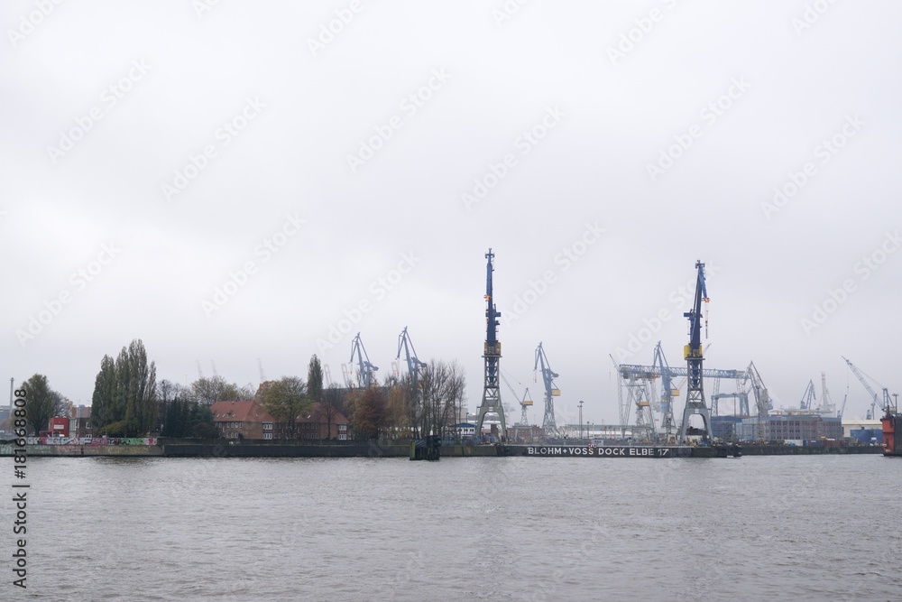 Hamburg, Germany- November 15, 2017: Hamburg Harbor during rainy day. Germany Hamburg, Germany- November 15, 2017: Hamburg Harbor during rainy day. Germany