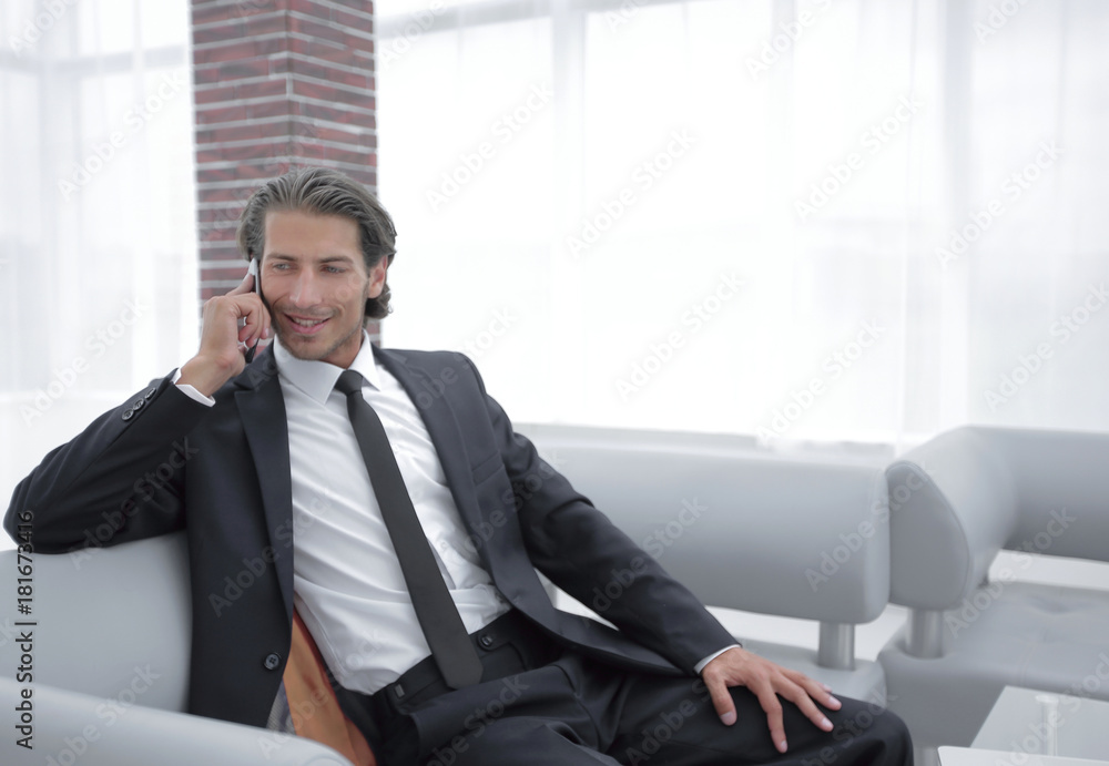 business man talking on smart phone. business man talking on smart phone.