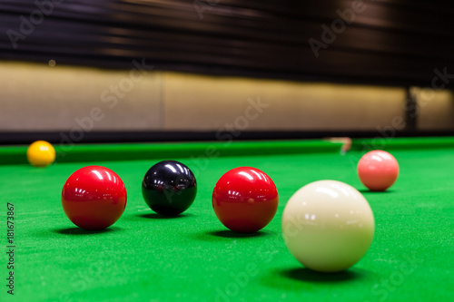 Snooker balls on the table at snooker club. photo