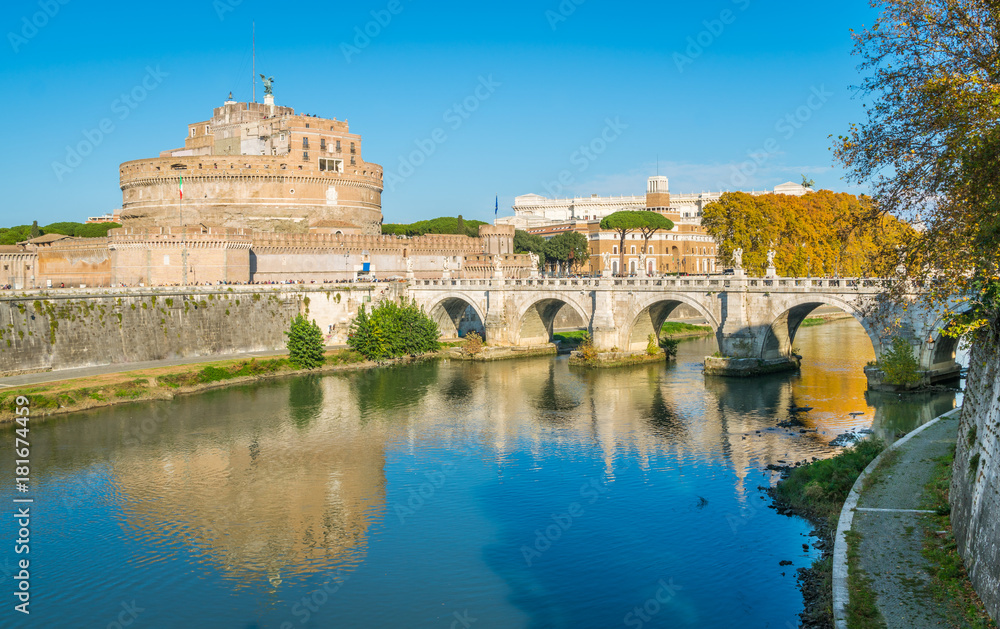 View of the famous Castel Sant'Angelo and the bridge over the Tiber river in Rome, Italy.