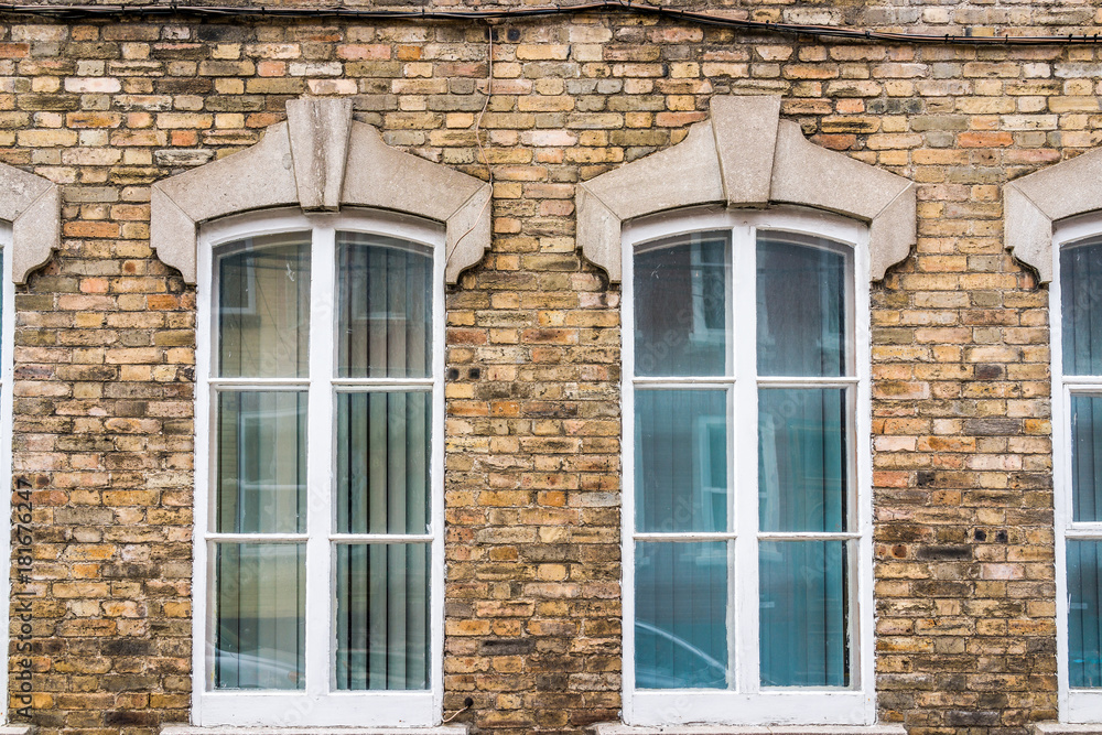 Old european brick building with windows in Quebec, Canada