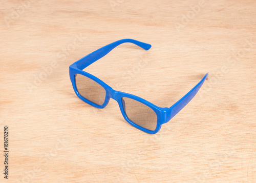 glasses blue on the wooden background