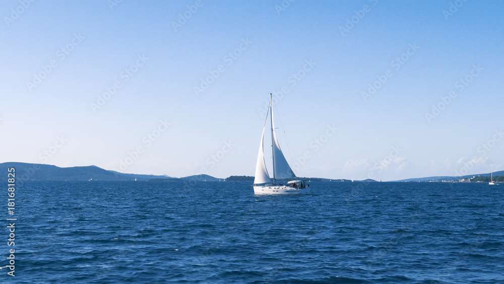 Sailing. Ship yachts with white sails in the Sea. Luxury boats. Boat competitor of sailing regatta.