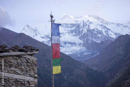 Buddhist gompa and prayer flags in the Himalaya mountains, Nepal
