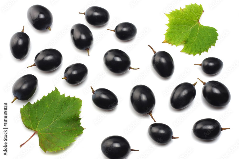 blue grapes berries with leaves isolated on white. top view blue grapes berries with leaves isolated on white. top view