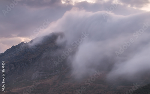 the fog moves fast through the mountains of Leon on a summer afternoon