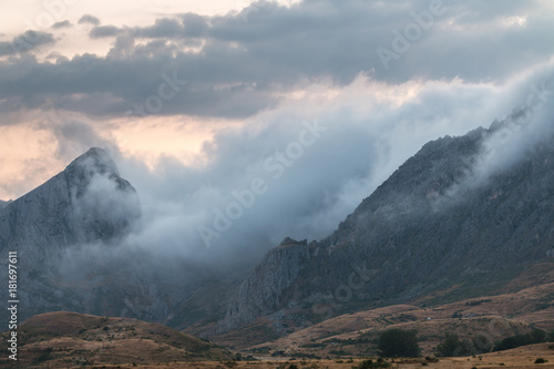 the fog moves fast through the mountains of Leon on a summer afternoon