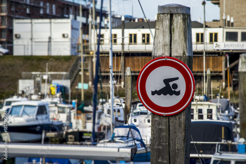 Forbidden swimming sign in Scheveningen marina