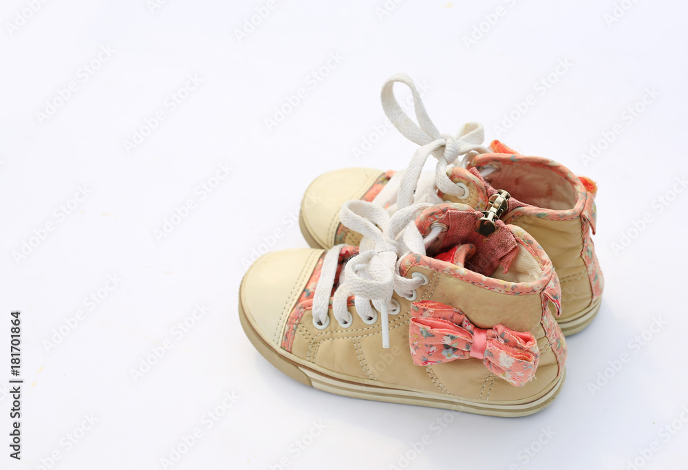 Pair of baby sneakers isolated on white background. Pair of baby sneakers isolated on white background.