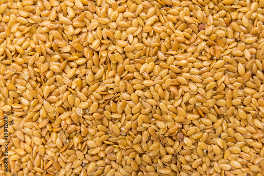 Golden Flax seed. Closeup of grains, background use. Golden Flax seed. Closeup of grains, background use.