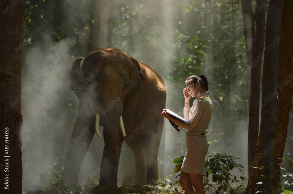 Beautiful teacher woman and elephant,vintage style,Thailand