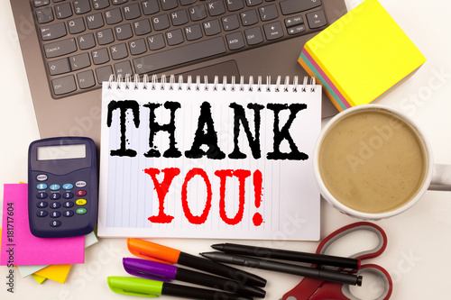 Word writing Thank You in the office with surroundings such as laptop, marker, pen, stationery, coffee. Business concept for Giving Gratitude Appreciate Message Workshop white background