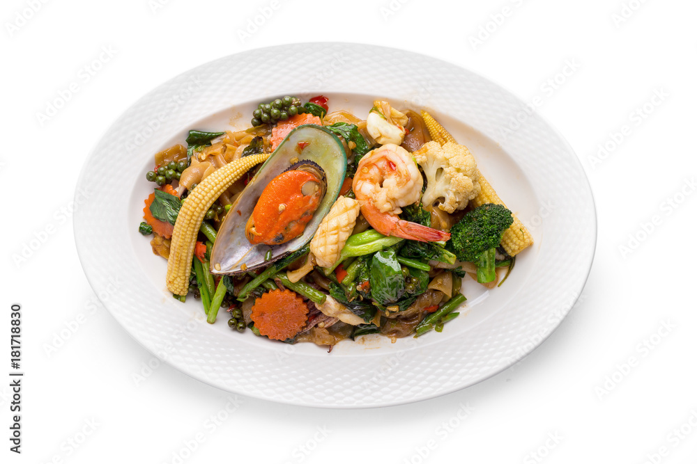 fired noodles with seafood and Spicy Sauce isolated on white background fired noodles with seafood and Spicy Sauce isolated on white background