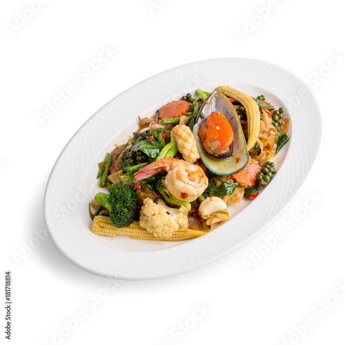 fired noodles with seafood and Spicy Sauce isolated on white background