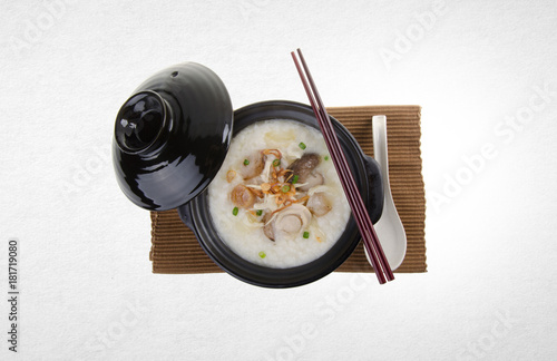 Porridge or abalone porridge in claypot on a background. photo