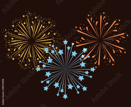 fireworks bursting in glowing multi colours on brown background