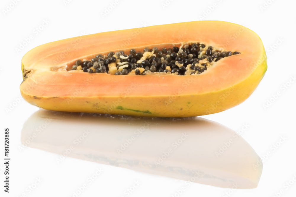 half cut papaya isolated on white background half cut papaya isolated on white background