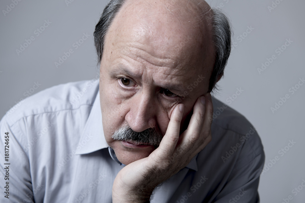head portrait of senior mature old man on his 60s looking sad and worried suffering pain and depression in sadness face expression head portrait of senior mature old man on his 60s looking sad and worried suffering pain and depression in sadness face expression
