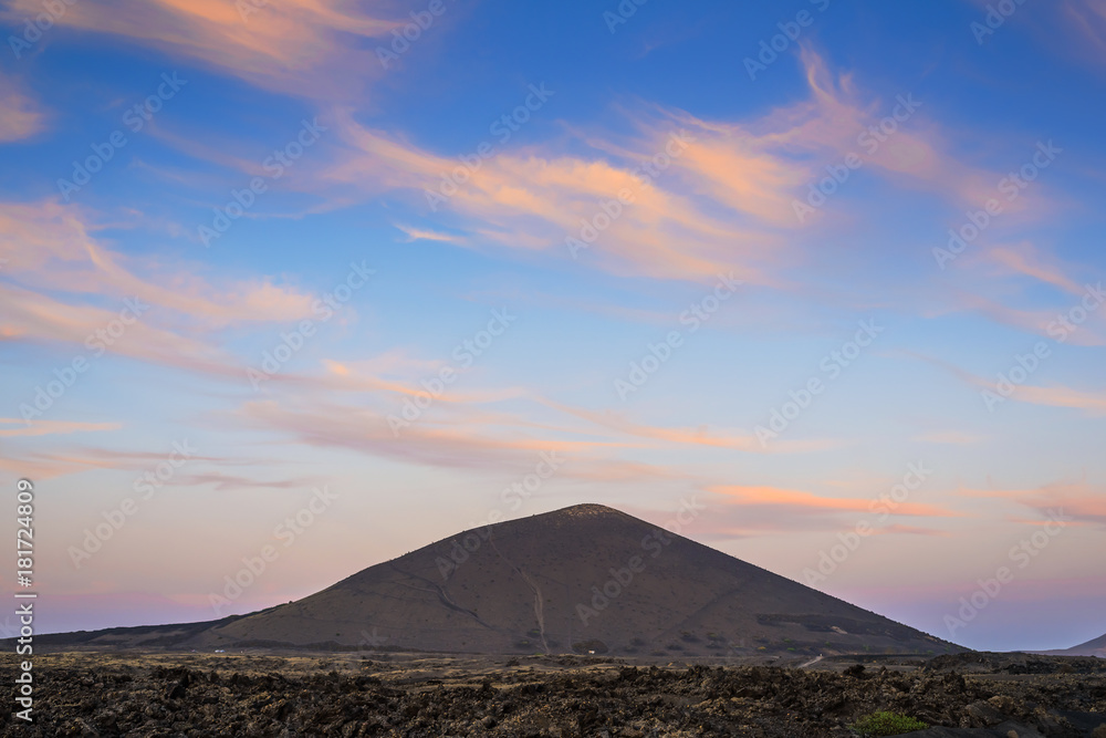 Stunning view of the volcanic landscape at sunset. Lanzarote. Canary Islands. Spain