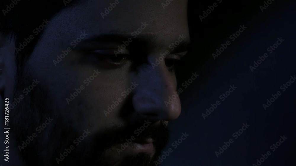 Lateral close up of hacker without glasses
Lateral close up of hacker without glasses