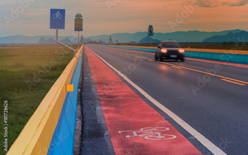 bicycle lane : bicycle sign on highway at sunset © sritakoset